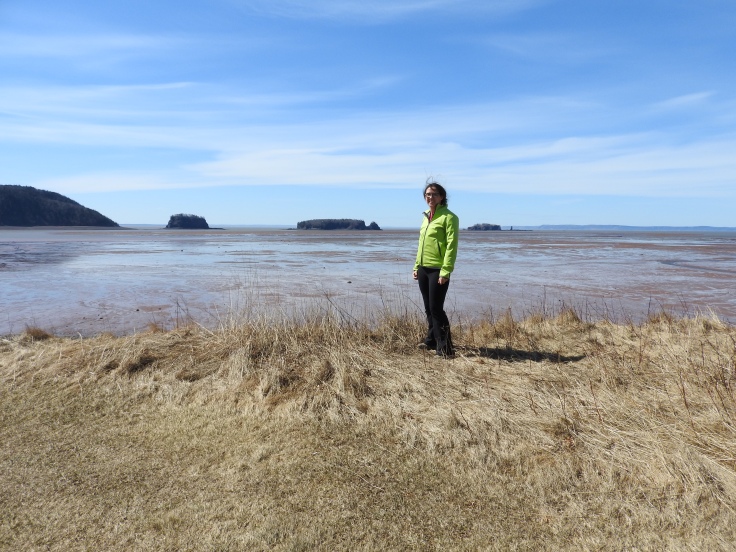 Me standing at the end of the lighthouse property, with the five island in the background